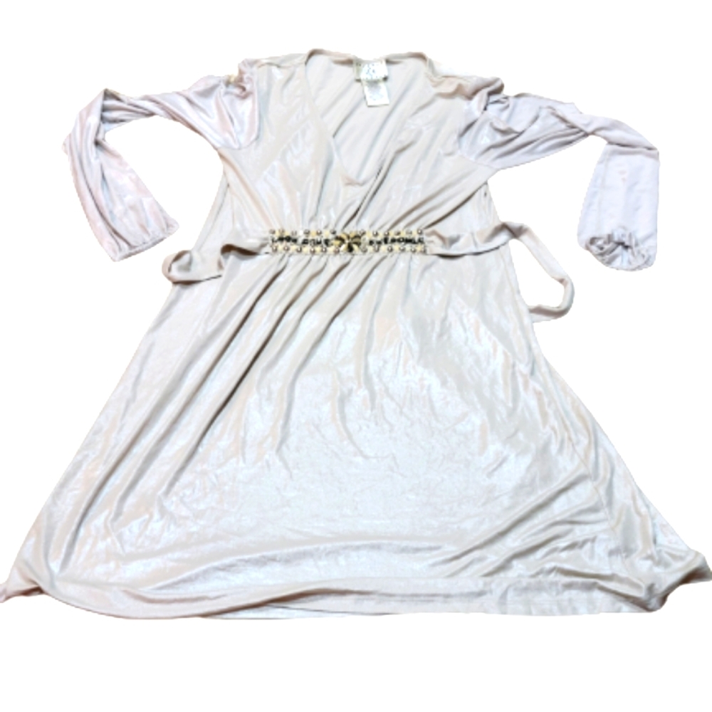 Ice long sleeve dress with cold shoulder. Accent jewelry waist belt tie. Plunge